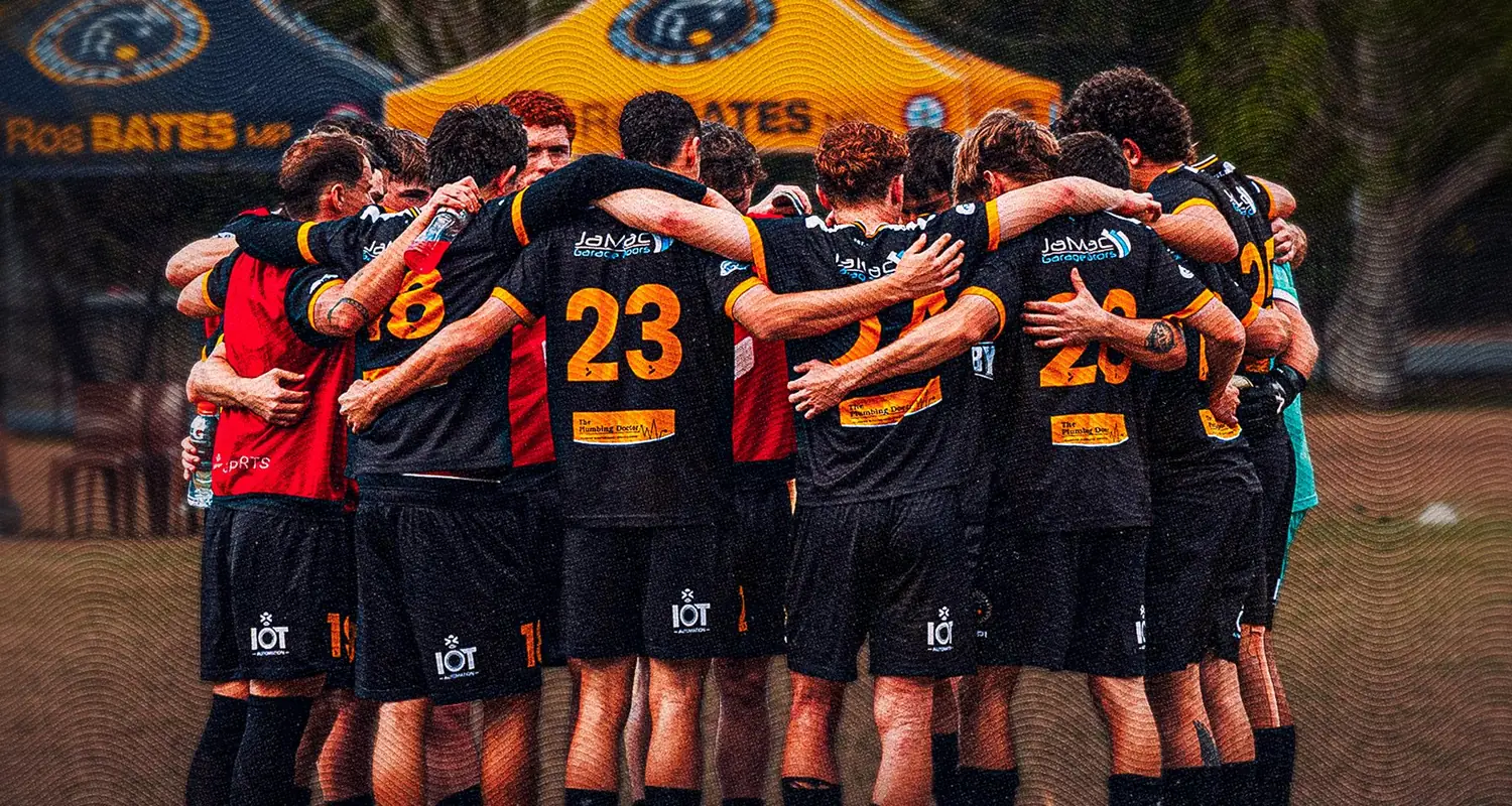 Mudgeeraba under-23s in a huddle before the grand final